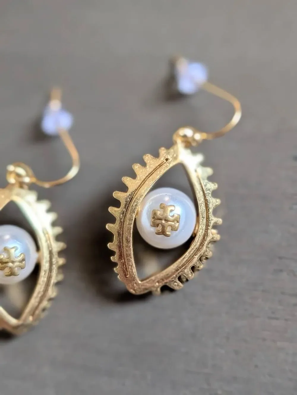 TORY BURCH Asymmetrical Gold Pearl Evil Eye Logo Drop Earrings